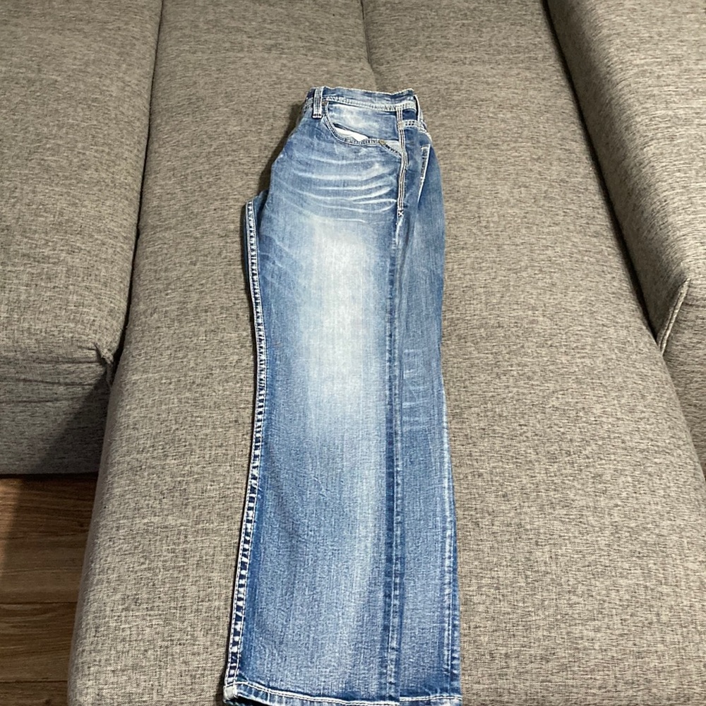 New without tags buckle jeans. Mens 31r carter straight leg jeans